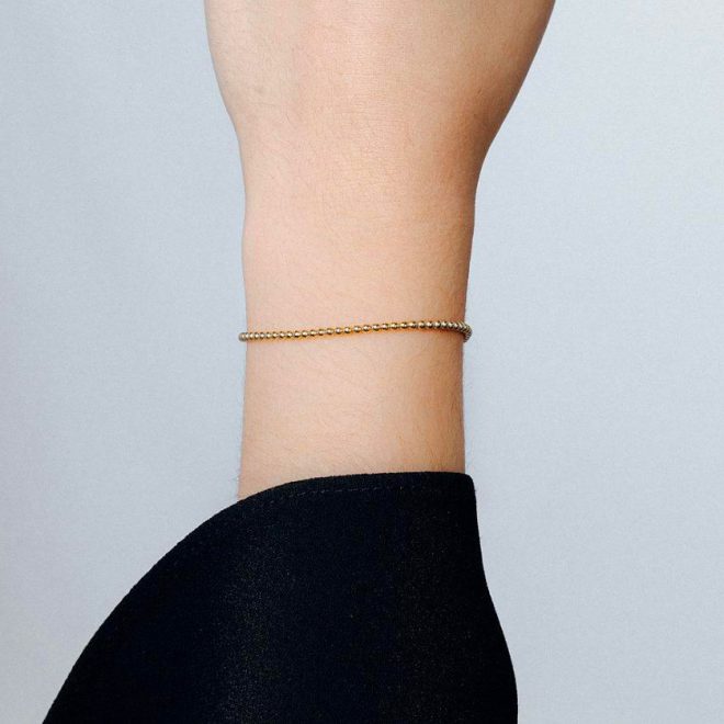 Pulsera fina con cadena continua de bolitas