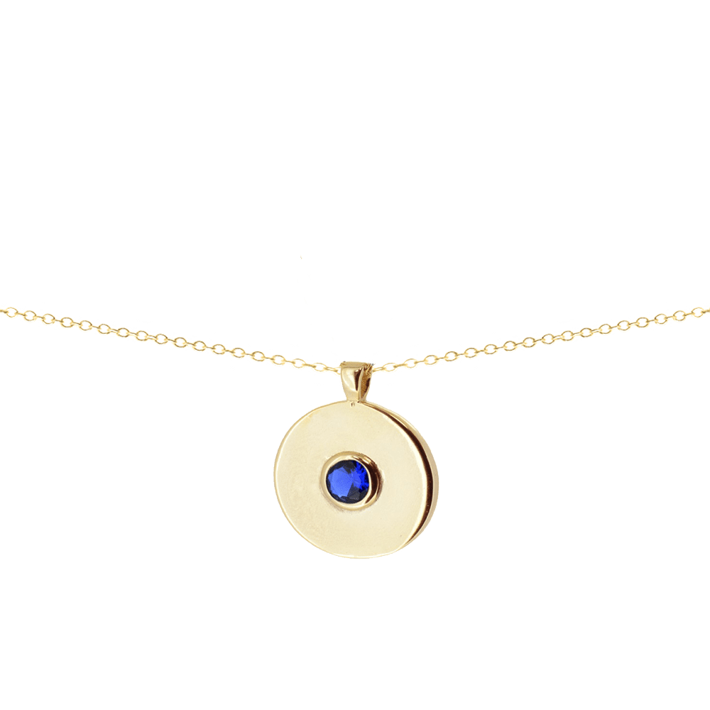 Colgante redondo karma con circonita azul zafiro